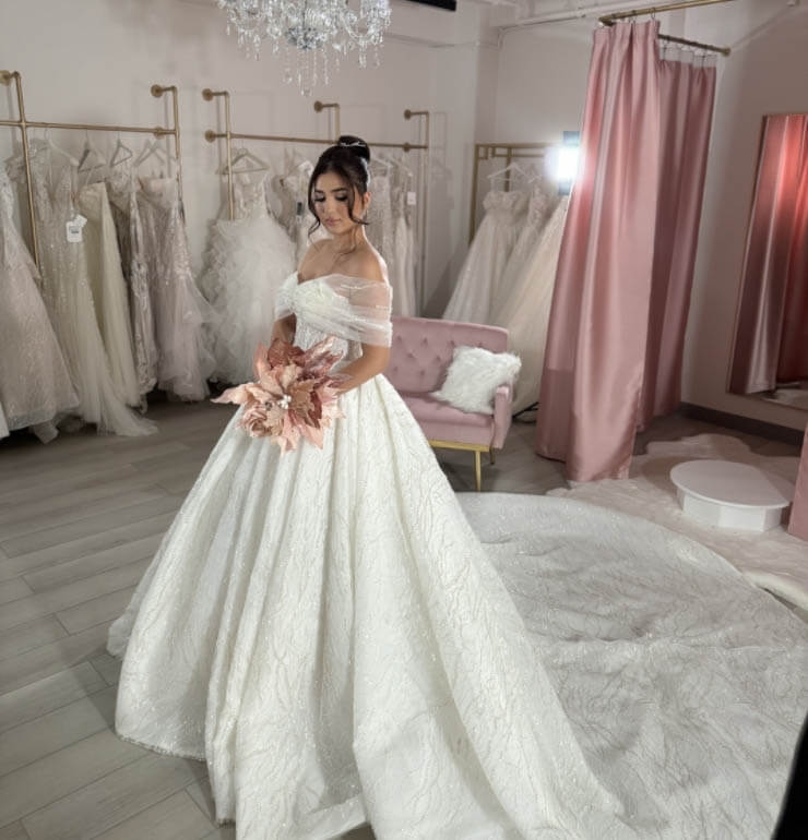 Model wearing a white bridal gown