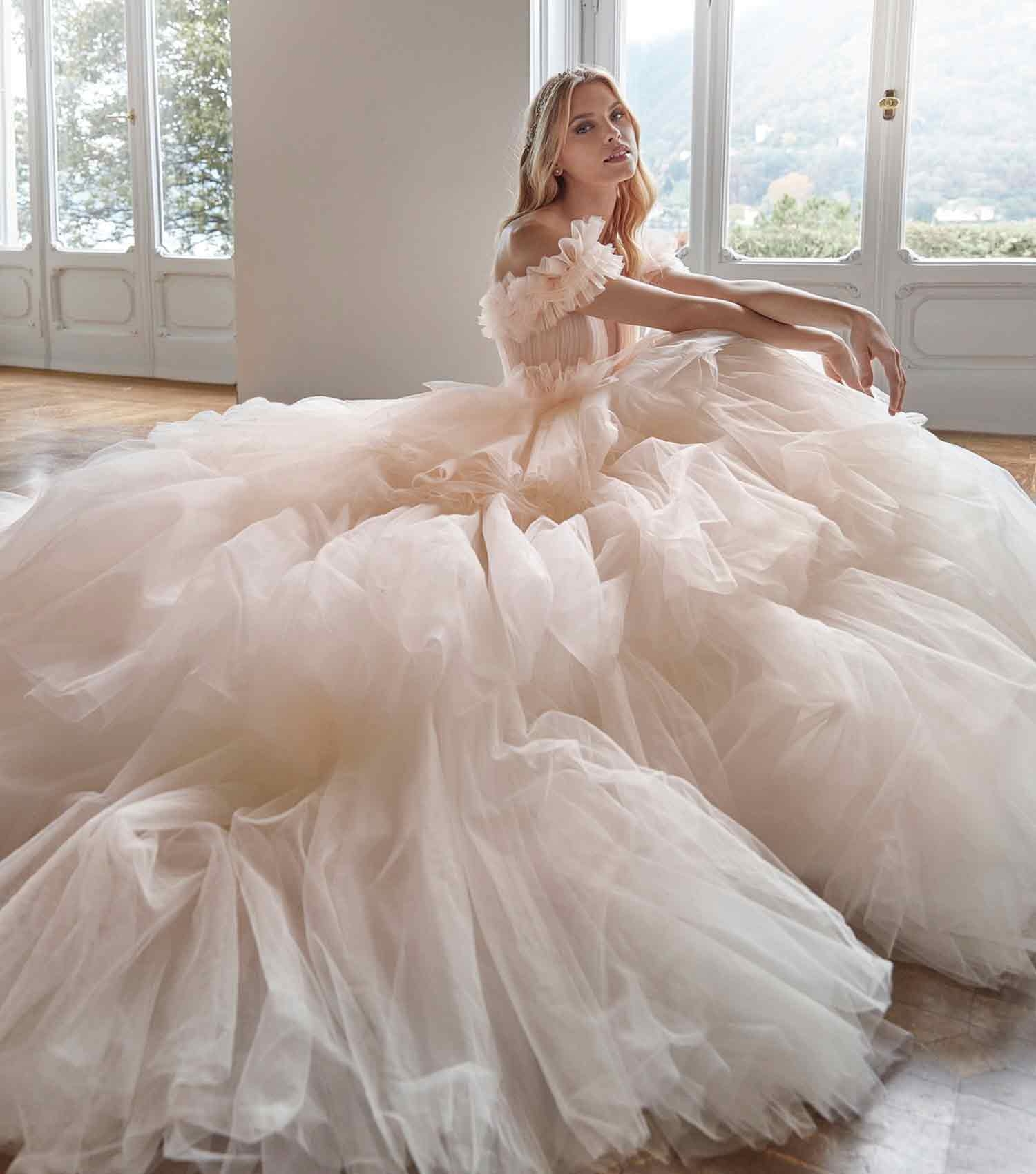 Image 41: Model wearing a milk dress. Mobile image