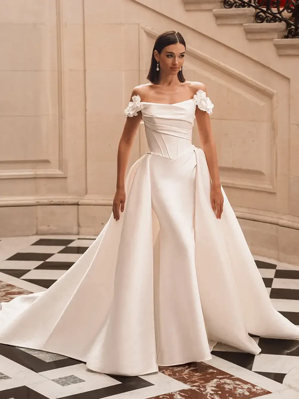 Image 28: Model wearing a gown by Elysee